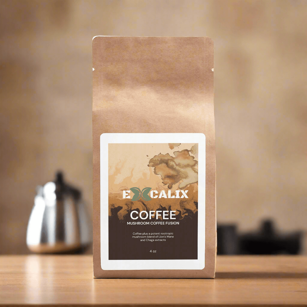 A brown paper bag of Excalix mushroom coffee is displayed on a wooden table in a cozy kitchen setting. The label on the bag features the Excalix logo and reads "Excalix Coffee, Mushroom Coffee Fusion." The background includes blurred kitchen elements such as jars and a coffee pot, creating a warm and inviting atmosphere